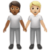 🧑🏾‍🤝‍🧑🏼 people holding hands: medium-dark skin tone, medium-light skin tone display on Apple